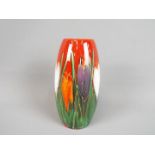 Anita Harris - an Anita Harris vase with crocus design signed to the base, approximate height 17.