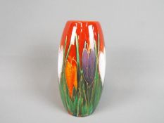 Anita Harris - an Anita Harris vase with crocus design signed to the base, approximate height 17.