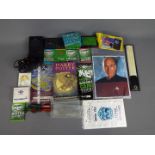 A mixed lot of collectables to include a Casio TV-600 LCD colour television, card trick set,