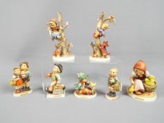 Hummel - Seven Hummel figurines including Out of Danger, Merry Wanderer, Village Boy and similar.