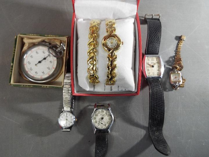 A quantity of wristwatches and a Smiths stop watch to include Lorus, Airman Services and similar.
