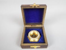 A Henry Hughes boxed brass compass
