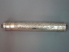 A presumed Indian silver scroll case with good quality repoussé decoration of foliate and floral