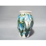 Moorcroft - a limited edition Moorcroft vase in the Dingle Dell design, No 9 of 40,