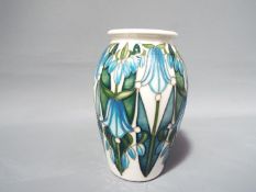 Moorcroft - a limited edition Moorcroft vase in the Dingle Dell design, No 9 of 40,