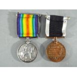 A WWI British War Medal named to PTE E V P TILLEY E SURR R and a Special Constabulary Long Service