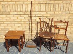 A nest of two tables, a Bentwood chair,