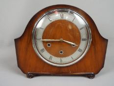 A mantel clock,