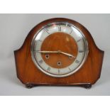 A mantel clock,