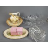 Three decorative glass centerpieces, a wash jug and bowl, two boxed Flower Fairies and similar.