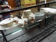 An Imperial Fine Bone China service, decorated with roses and gilt rim, comprising six cups,