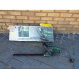 A Bosch PHS 46 G electric hedge trimmer, with box.