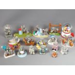 A collection of 'Me To You' bear figurines and a Disney musical snow globe.
