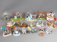 A collection of 'Me To You' bear figurines and a Disney musical snow globe.