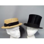 Two vintage hats comprising a Cuthbertson top hat (approximately 55 cm internal circumference) and