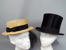 Two vintage hats comprising a Cuthbertson top hat (approximately 55 cm internal circumference) and