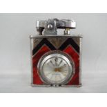 An Art Deco styled desk watch or small travelling clock in the form of a lighter,