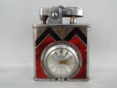 An Art Deco styled desk watch or small travelling clock in the form of a lighter,