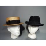 Two vintage hats comprising Woodrow of London straw boater (approximately 60 cm internal