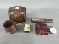 A collection of military related items to include match box cover Smiths stop watch 1/5 sec