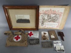 A collection of military related items to include a King's Certificate of Discharge for Sgt.