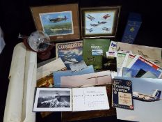 A collection of aviation related items including framed prints, The Royal Air Force A Video History,