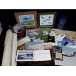 A collection of aviation related items including framed prints, The Royal Air Force A Video History,