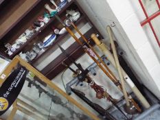 A mixed lot to include ceramics, vintage fishing rod, scythe,