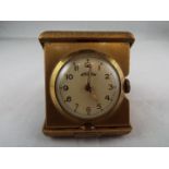 An Art Deco styled purse watch or small travelling clock,