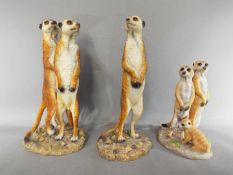 Three Naturecraft models of Meerkats, largest approximately 32 cm (h).