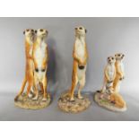 Three Naturecraft models of Meerkats, largest approximately 32 cm (h).