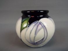 Moorcroft - a Moorcroft 'White Rose' vase, approximate height 5.