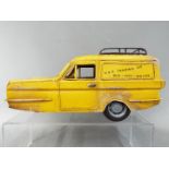 A metal model of a Reliant Regal Supervan III in the style of the Only Fools and Horses van by