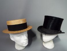 Two vintage hats comprising a Sam Marshall of Hyde top hat (approximately 57 cm internal