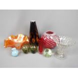 A quantity of glassware to include a Whitefriars style hexagonal section vase, art glass vases,