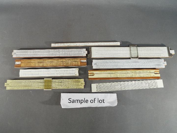 A large collection of various slide rules, different makes and models, in excess of 25 examples. - Image 2 of 2