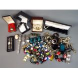 A quantity of costume jewellery, cameo brooch and wristwatches to include Citron, Zeon and similar.