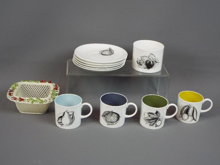 Four Black Fruit Demitasse coffee cups (dia. 6.5cm) and saucers (dia.