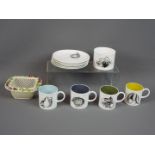 Four Black Fruit Demitasse coffee cups (dia. 6.5cm) and saucers (dia.