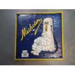 A cast iron Michelin sign,