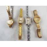 A collection of four lady's wristwatches