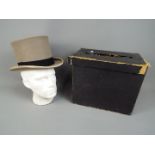 A boxed Bates of London top hat (approxi