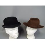 Two vintage hats comprising a Harrods of