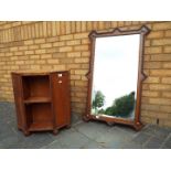 A good quality oak framed wall mirror 67 cm x 108 cm and a hexagonal 1920's drinks cabinets,