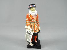 Royal Doulton - A rare figurine depicting a Beefeater in standing pose, approximately 19.