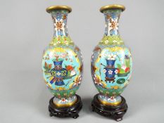 A pair of Chinese cloisonné enamel vases,