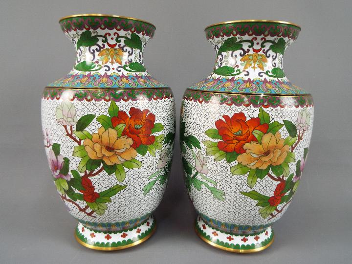 A pair of Chinese cloisonné vases decorated with flowers, birds and insects on a white ground, - Image 2 of 3