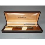 A boxed Sheaffer fountain pen with 14ct gold nib.