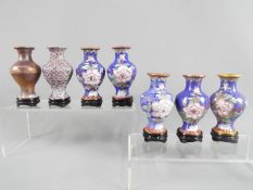 A 20 th century set of seven Chinese vases of baluster form showing the stages of producing a