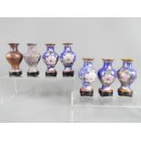 A 20 th century set of seven Chinese vases of baluster form showing the stages of producing a